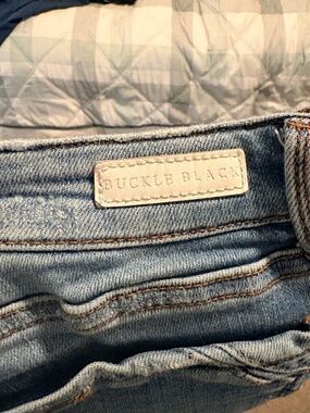 Buckle black jeans tall